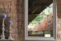 MirrorDeco’s Victoire Over Mantle Mirror: A Grand Statement