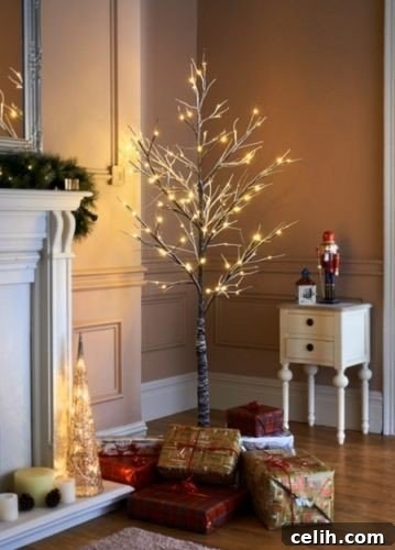 Chic Outdoor Twig Christmas Trees 3 Love this gorgeous 7ft pre-lit snowy twig style Christmas tree. It can be used indoors or out.