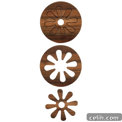 Sagaform Two-Piece Walnut Flower Trivet Fun and functional flower trivet made of two pieces of rich walnut wood, shown assembled