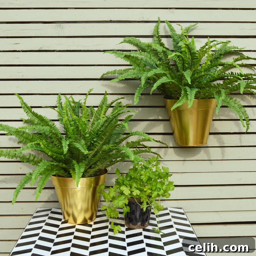 Striking gold metallic wall planter. 