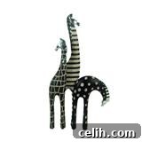 Cargo three giraffe sculpture set Set of three black and white giraffe sculptures from Cargo