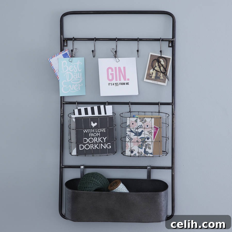 Useful industrial style metal wall storage unit that would work in so many rooms.