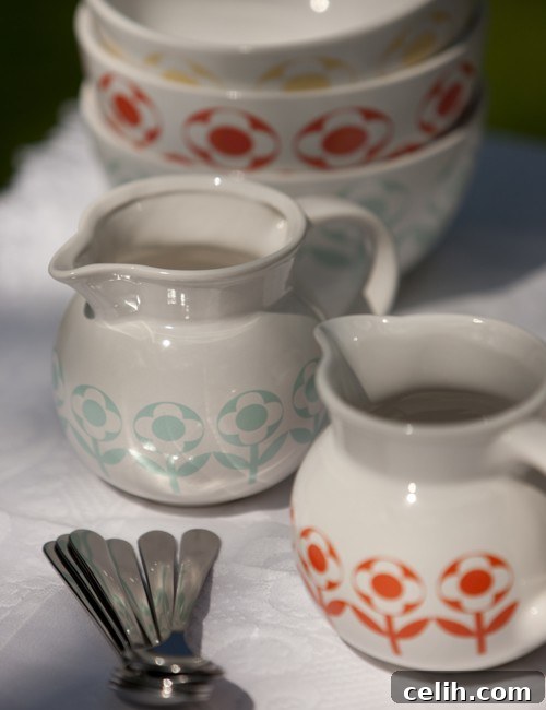 Charming pale blue daisy pattern jug, ideal for beverages or decoration