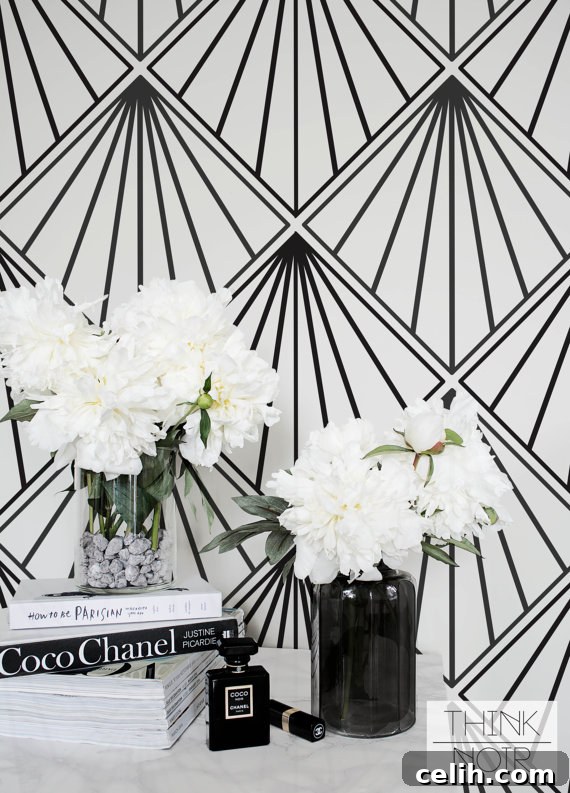 Create the art deco look in your home with this stunning wallpaper, available from Etsy, featuring intricate geometric patterns.