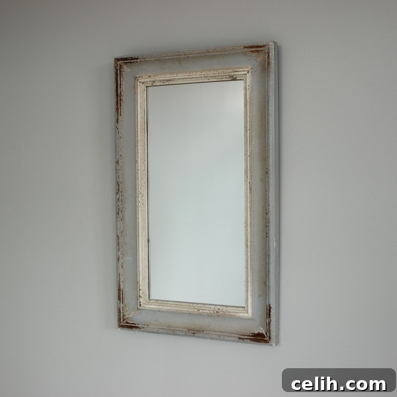 Distressed grey wall mirror 