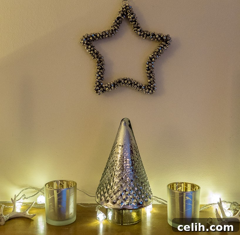 Pretty fireplace Christmas decoration idea with a silver theme