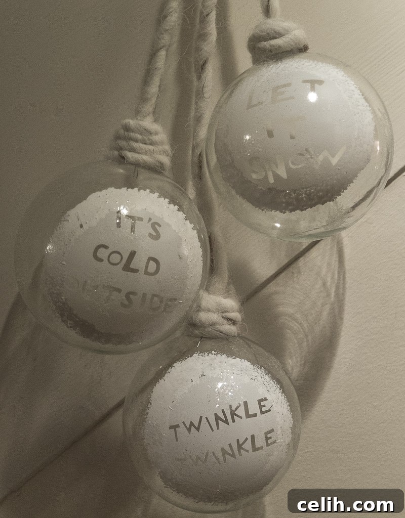Large white baubles make an attractive hanging Christmas decoration