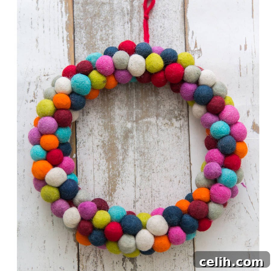 Multicoloured bobble felt wreath - handmade and perfect for a pop of colour