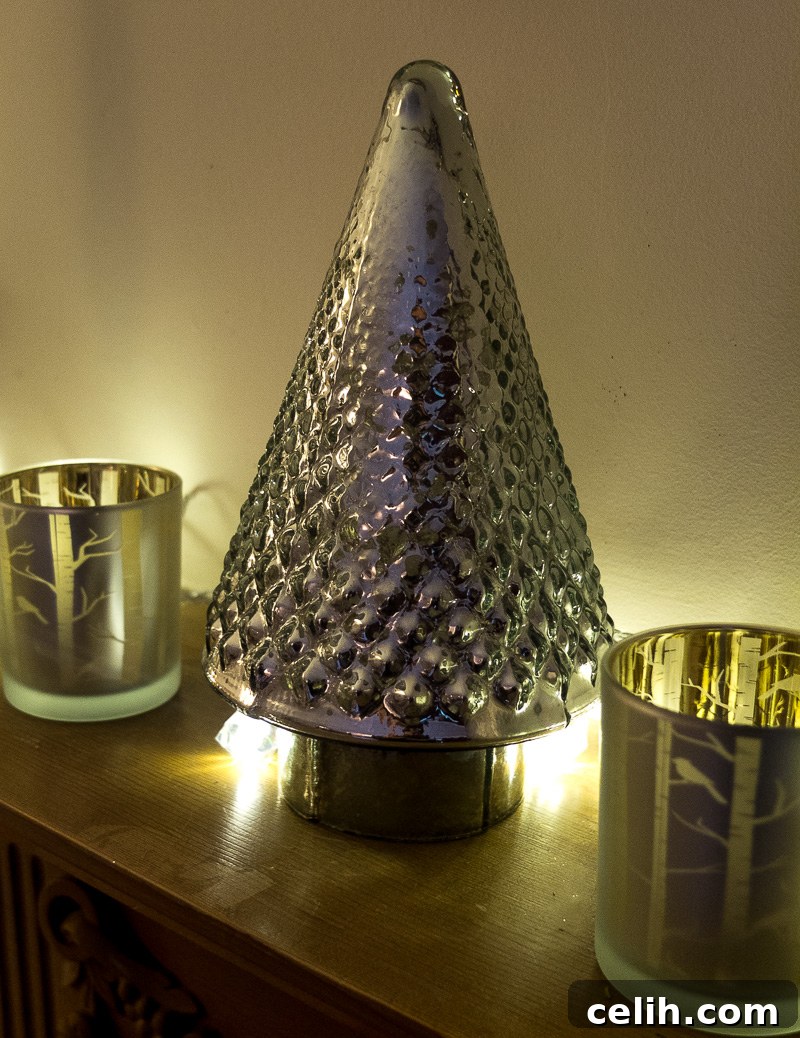 Candlelit Christmas decorations at Fresh Design Blog featuring a silver Christmas tree
