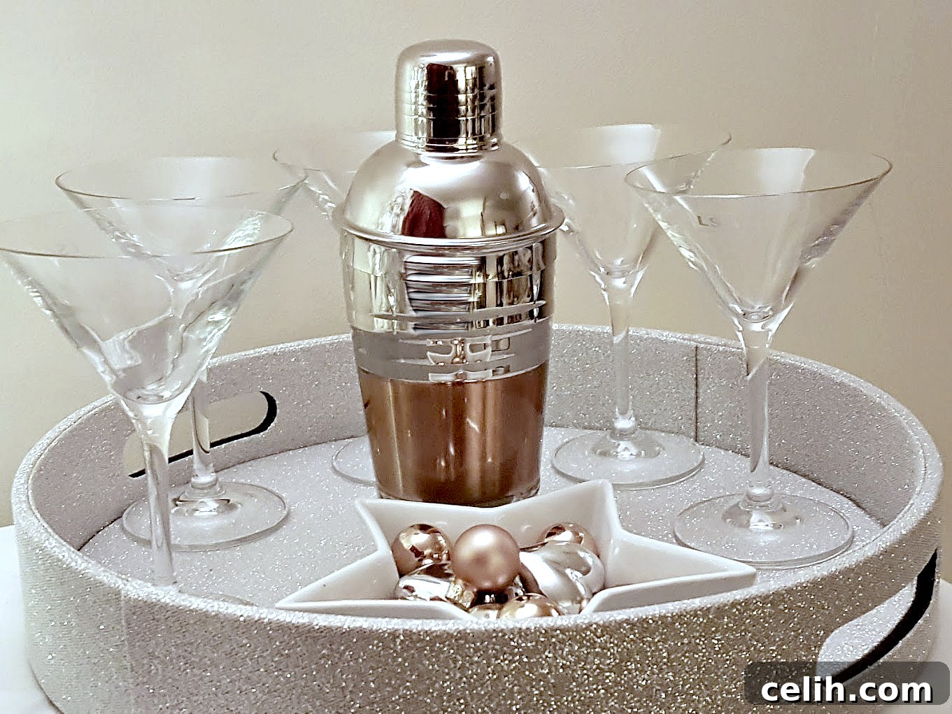Stylish copper and silver cocktail shaker and round silver tray for Christmas entertaining