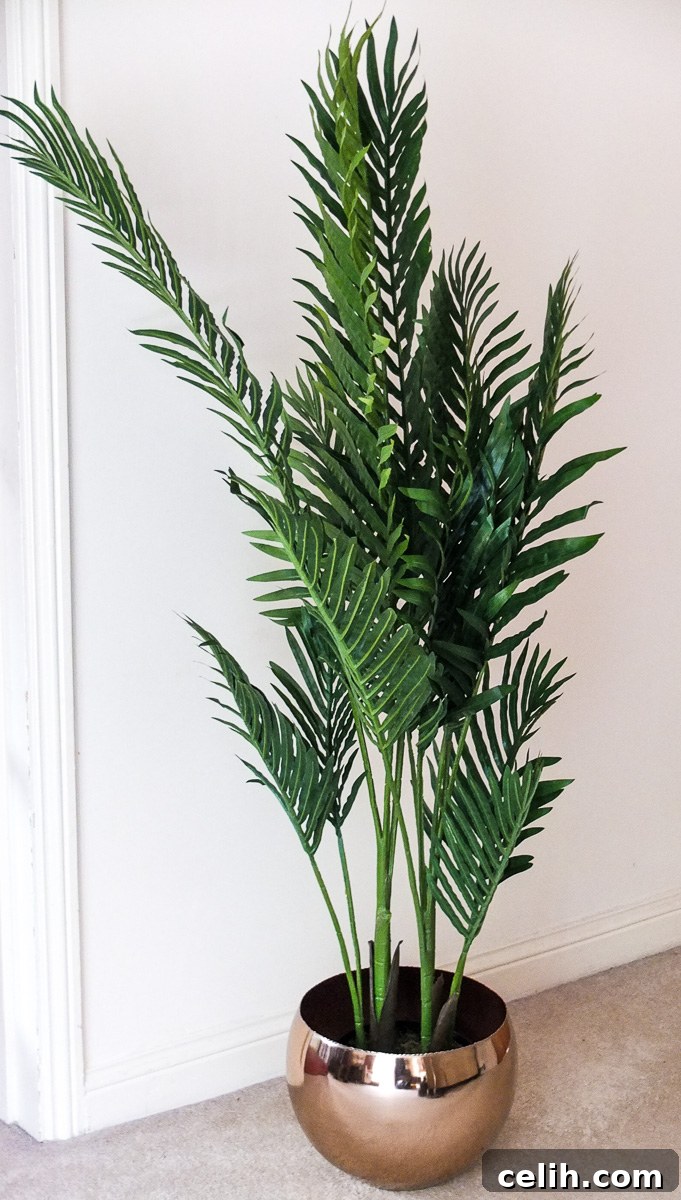 Add a tropical feel to your home with an artificial Paradise Palm plant