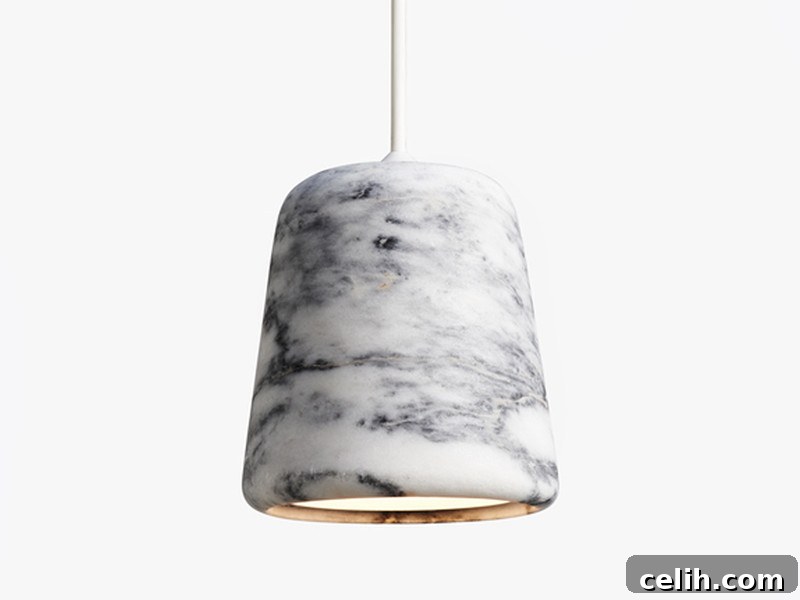 Bright Ideas: 2017 Home Lighting Trends 2 Stunning white and black marble pendant light by New Works, a luxurious focal point for modern interiors with natural veining