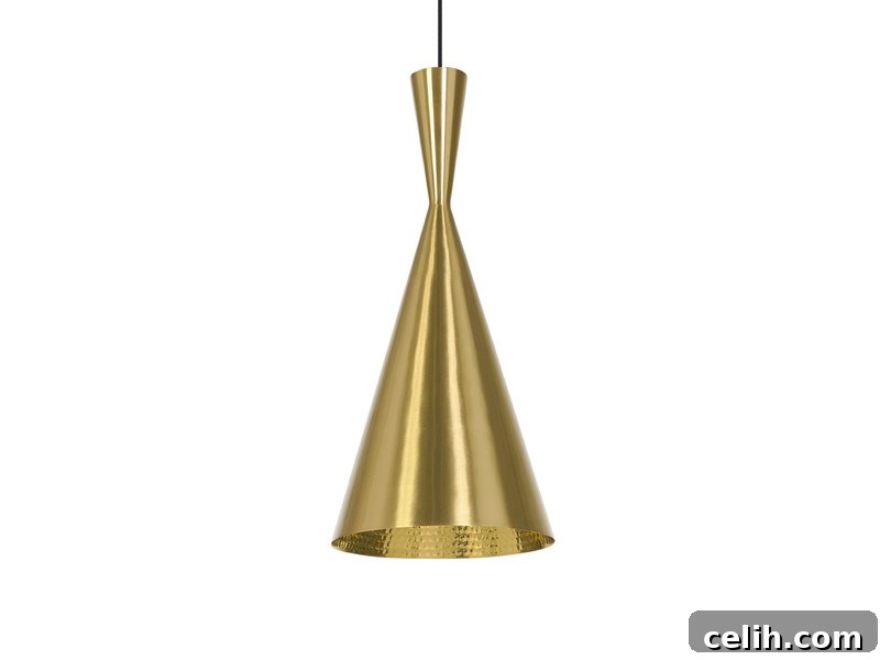 Bright Ideas: 2017 Home Lighting Trends 3 Elegant tall Tom Dixon Beat light in a beautiful brass finish, inspired by traditional Indian water vessels and cooking pots
