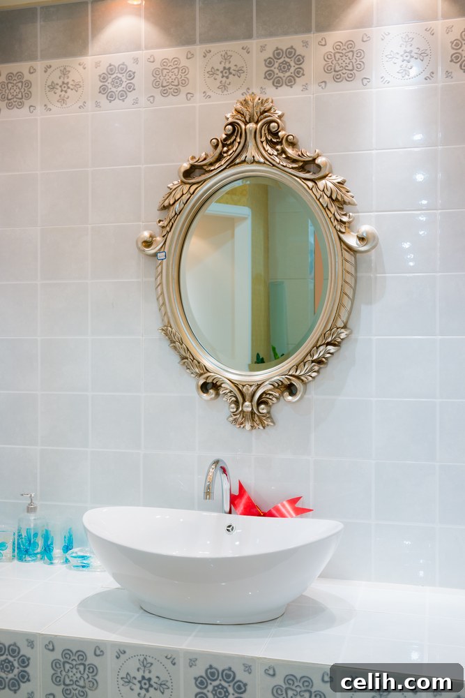 Smarten your bathroom up with an ornate mirror to add style and open up the space