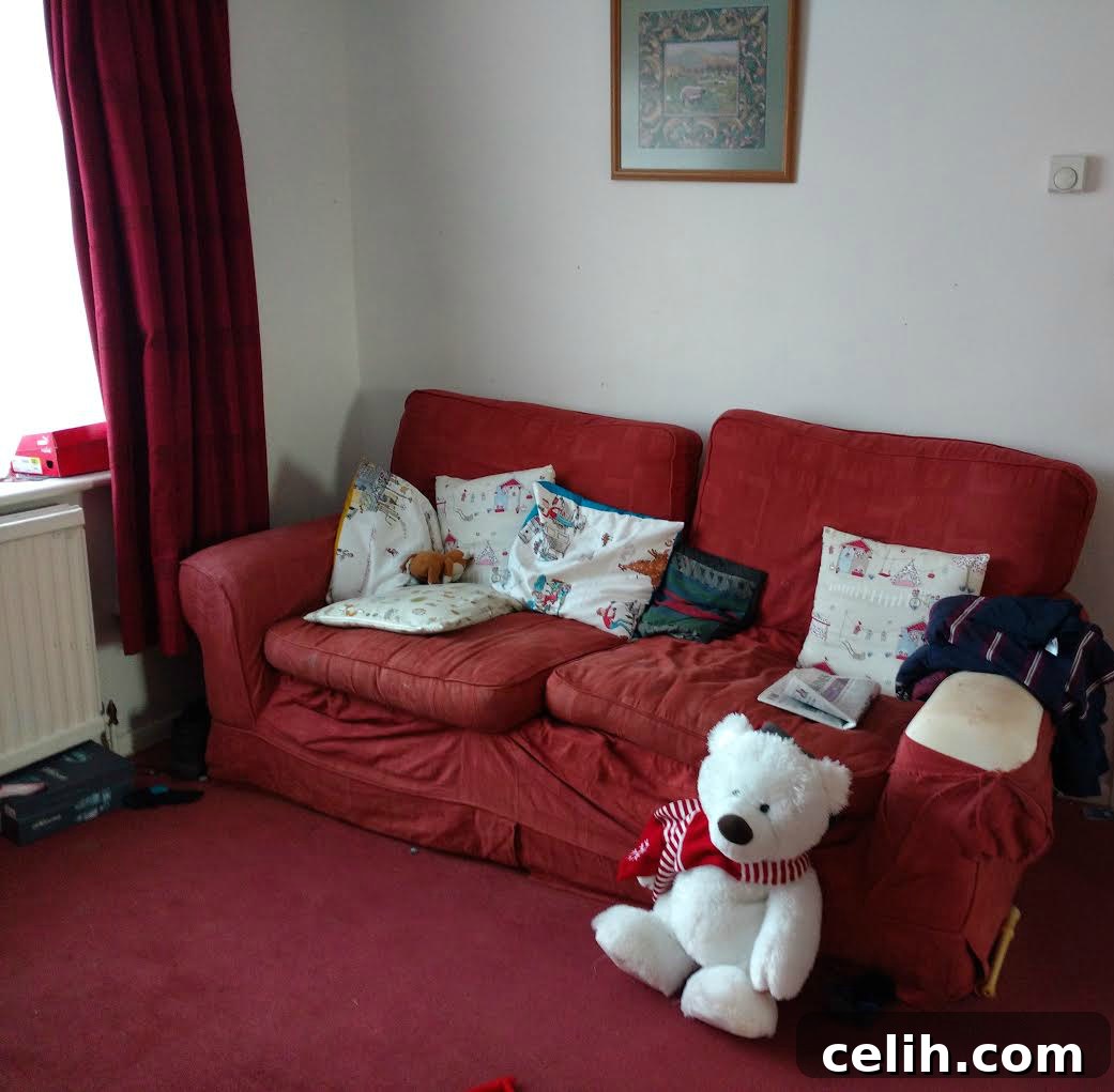 Sad looking, well loved and used sofa that has come to the end of its life, ripe for a refresh