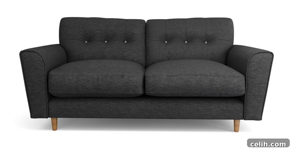 Arden sofa in a practical and stylish charcoal fabric chosen for a family living room