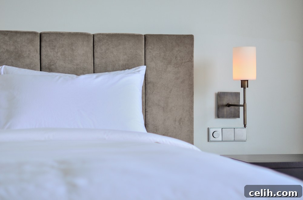 Decorative wall sconces adding lower level lighting in a stylish interior