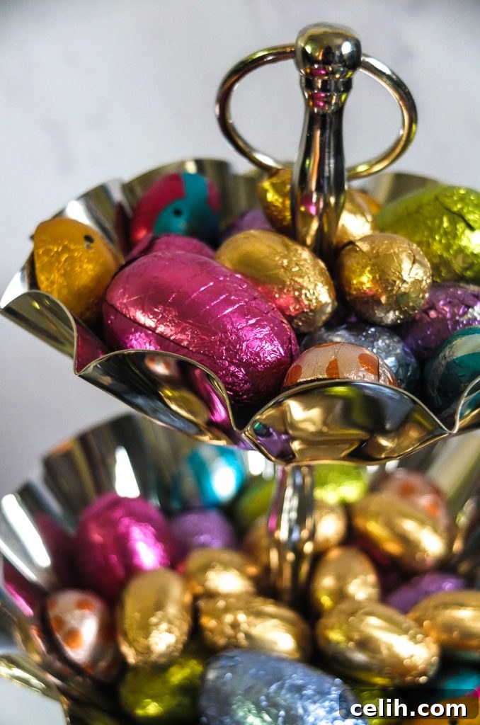 Smart Easter Decorating with Homesense Savings 5 Colourful wrapped mini Easter eggs look delightful displayed in a silver tone two tier decorative cake stand