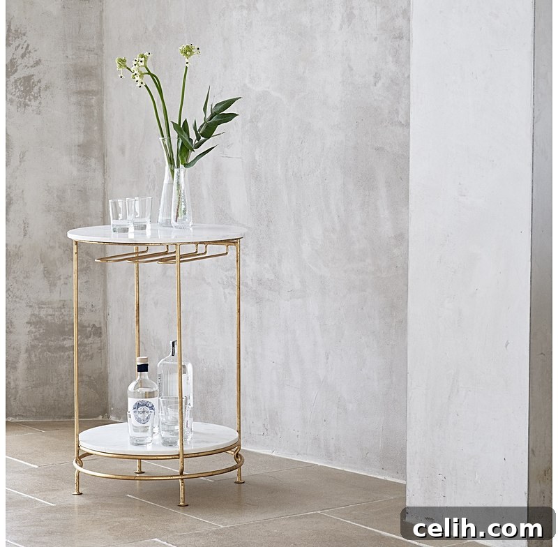 Retro style gold and marble topped elegant round bar cart table