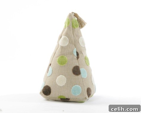 Elegant stripe fabric doorstop with a tassel by Pins and Ribbons