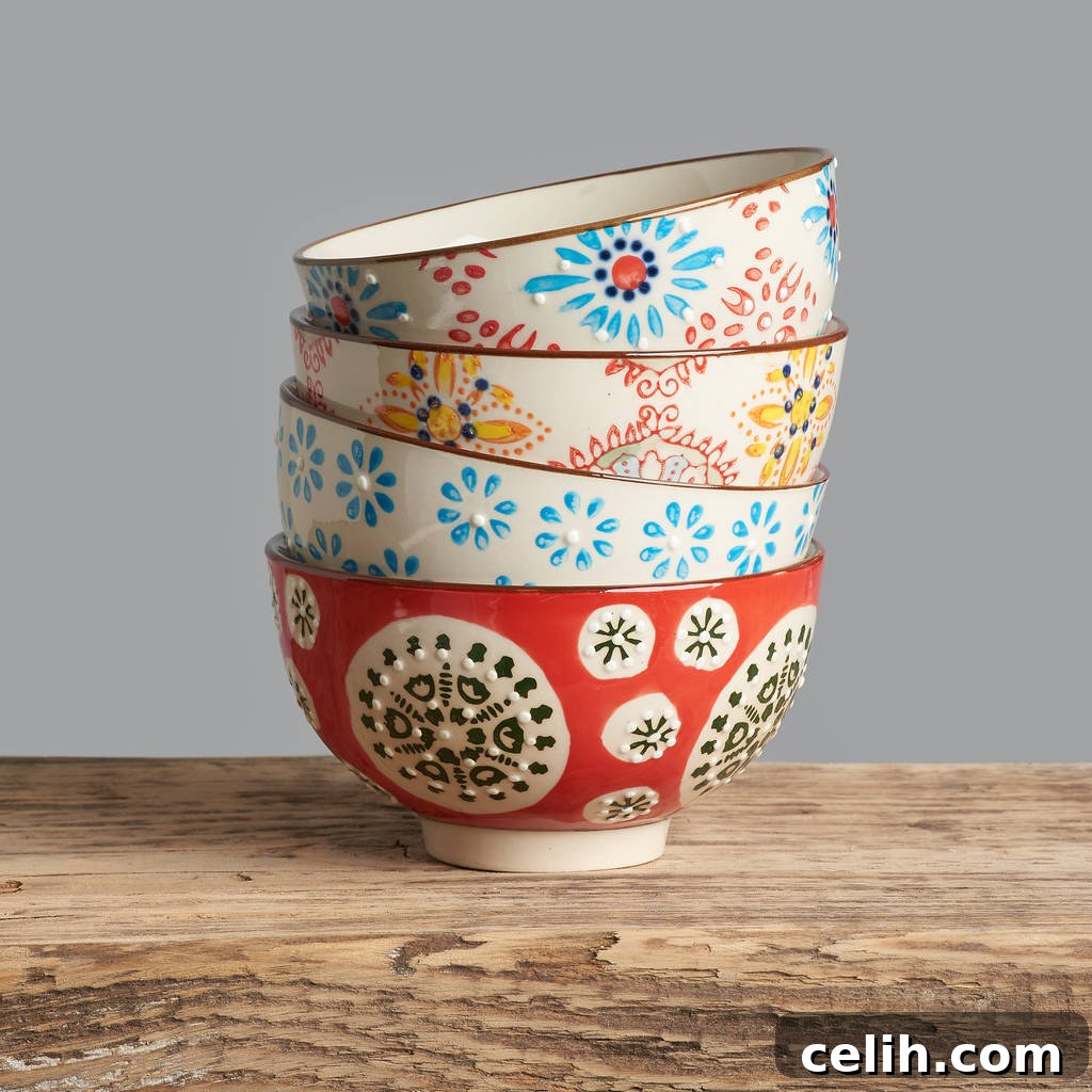 A delightful set of four gorgeous bohemian patterned ceramic bowls from Horsfall & Wright, bringing vibrant colors and unique artistry to your dessert table. Ideal for adding character and charm.