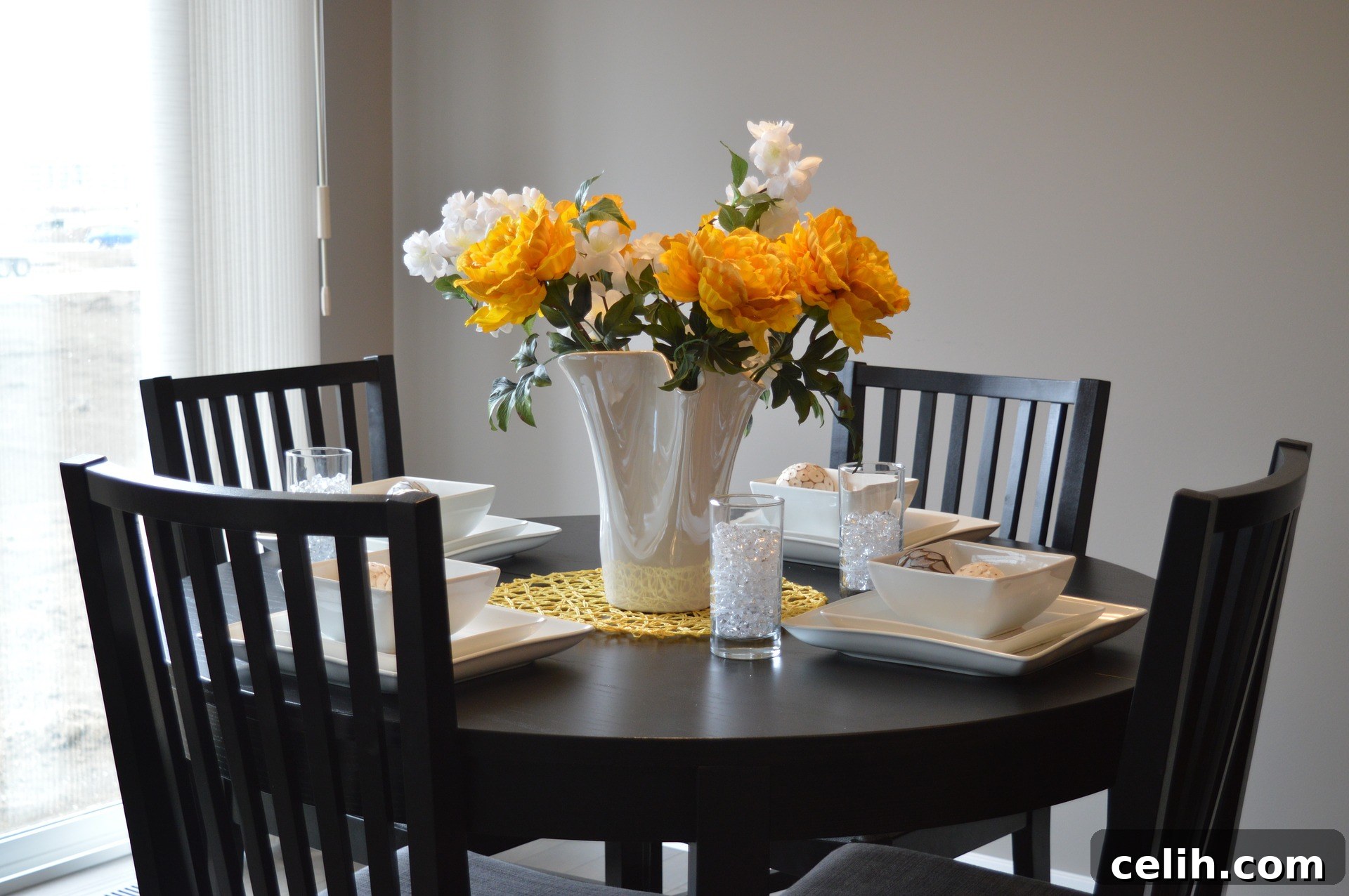 A perfectly paired round dining table and matching chairs