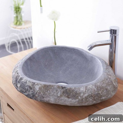 Love this truly organic pebble stone wash basin, cut from a large river stone, perfect for a modern or natural bathroom design.