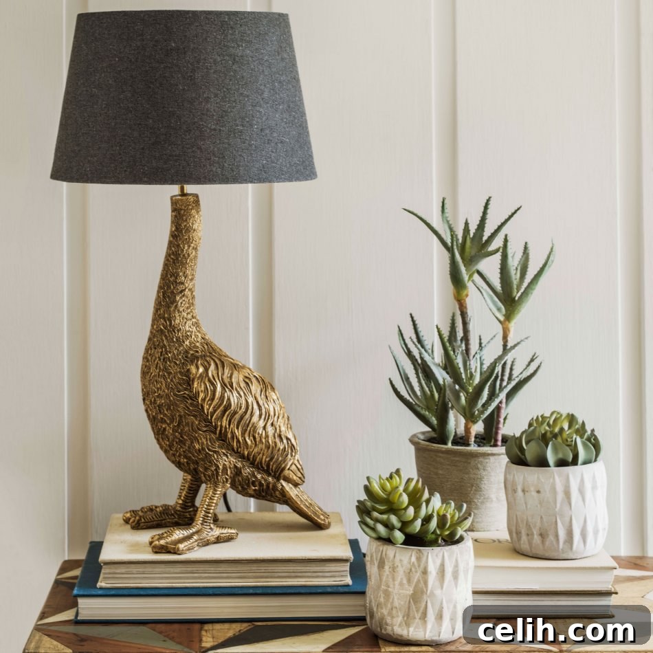 Whimsical Illumination: Playful Animal Lamps for Your Space 3 Gorgeous Gertrude the golden goose animal themed lamp from Graham and Green for sophisticated decor