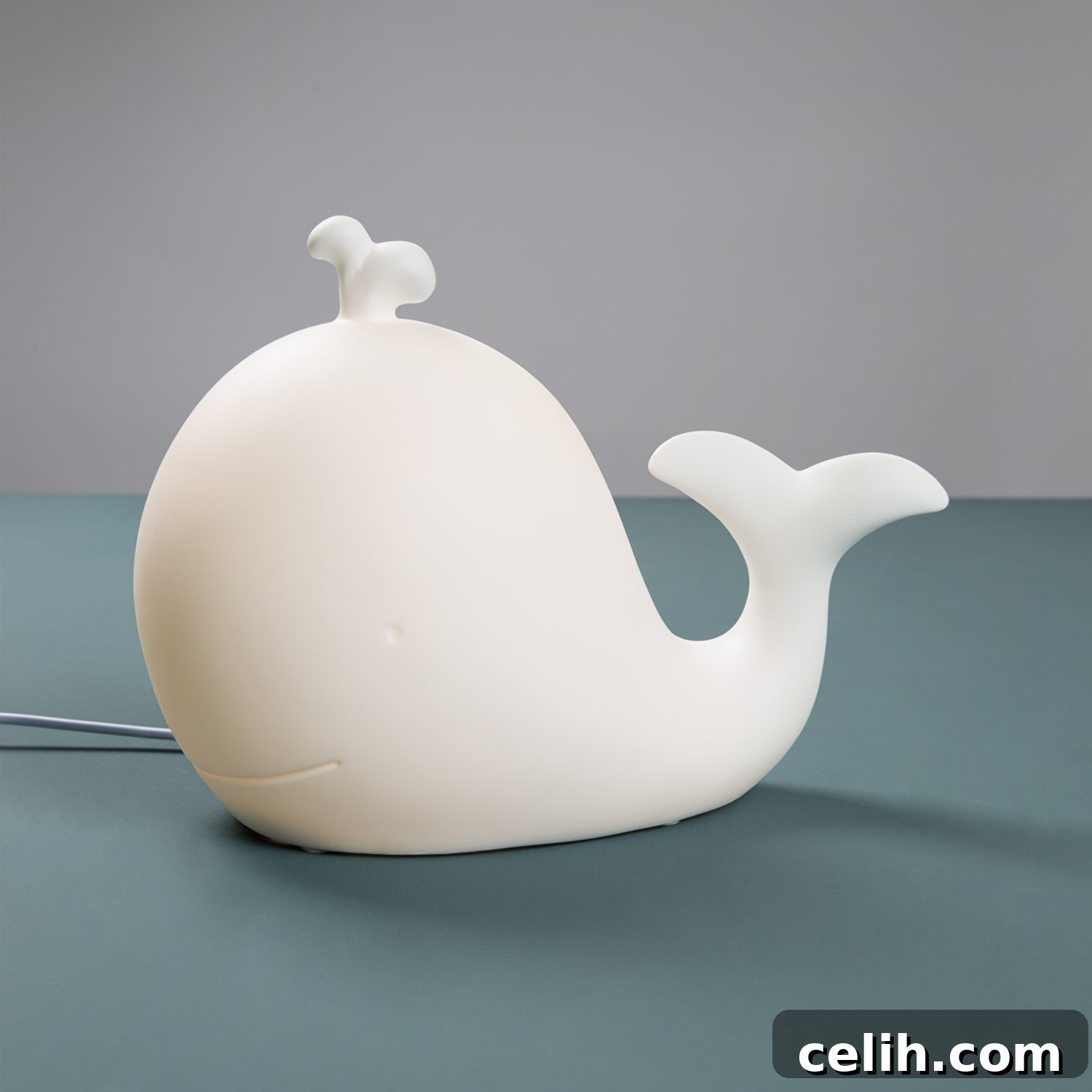 Whimsical Illumination: Playful Animal Lamps for Your Space 5 Super cute and quirky porcelain whale design lamp, perfect for any room