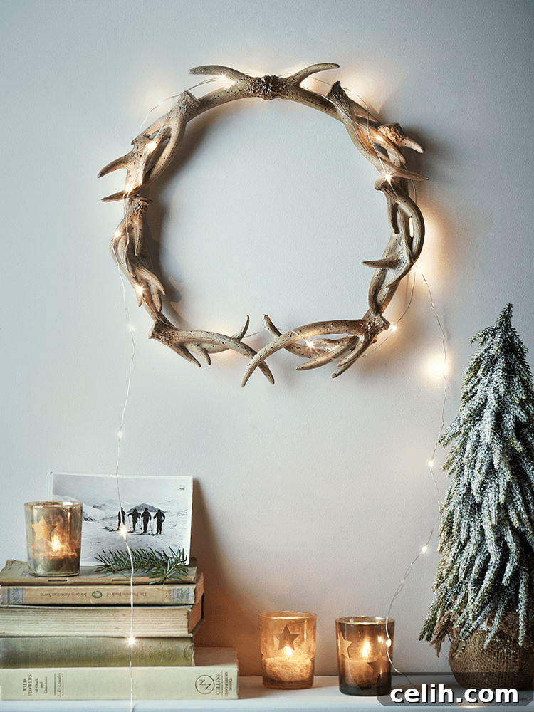 Deck the Halls with Amazing Christmas Wreath Hanging Ideas 4 Unusual and striking faux antler Christmas wreath decoration, cast in lightweight resin with a textured painted finish, perfect for a rustic or modern farmhouse holiday theme. Looks beautiful with added string lights.