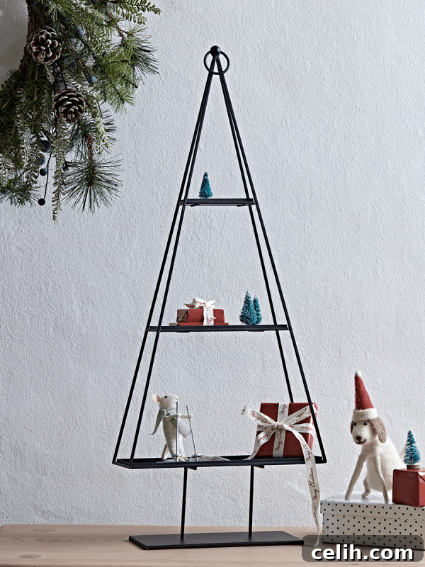 Nice Christmas tree shelf idea to use to create a festive table centrepiece or window sill display