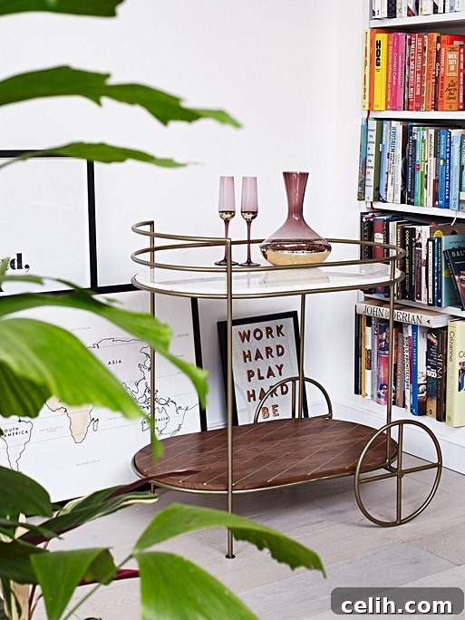 Curated Bar Carts For The Perfect Home Happy Hour 5 Classic bar cart style drinks trolley made from solid dark acacia wood and marble