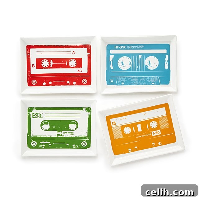 Colourful set of four 80s mixtape design serving plates, perfect for adding a nostalgic and quirky touch to party food and unique table settings.