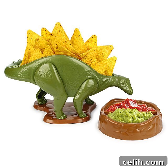 Fun and quirky Nachosaurus snack and dip set, featuring a stegosaurus for nachos and a volcano dip bowl – perfect for playful party food presentation.