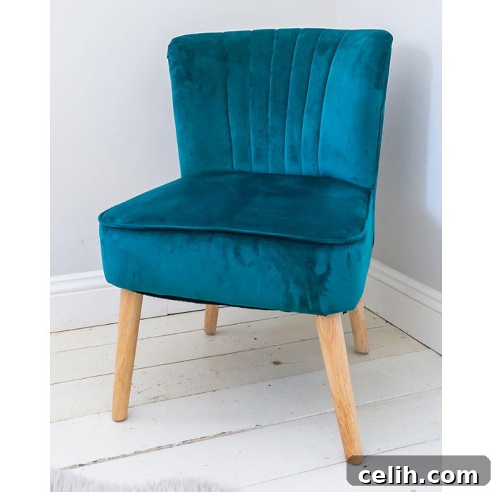 Support a good cause by buying this luxurious velvet oyster 1950s style chair from the Sue Ryder charity shop online