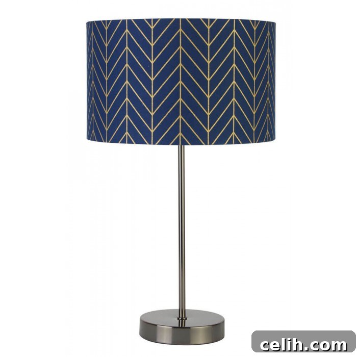 Contemporary gold table lamp with navy geometric design shade, stylish and affordable