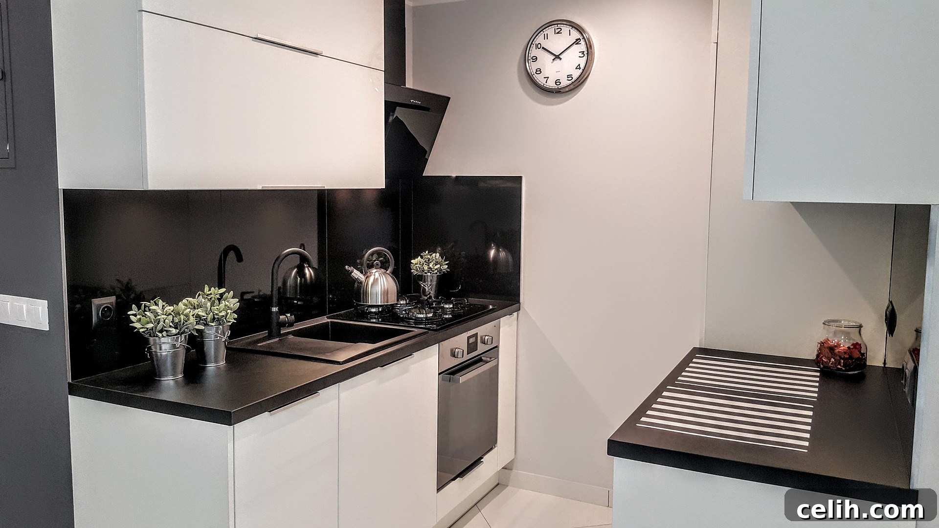 Tiny Kitchen Design Hacks You Can Afford 4 Small kitchen featuring compact and slimline appliances for maximum space efficiency