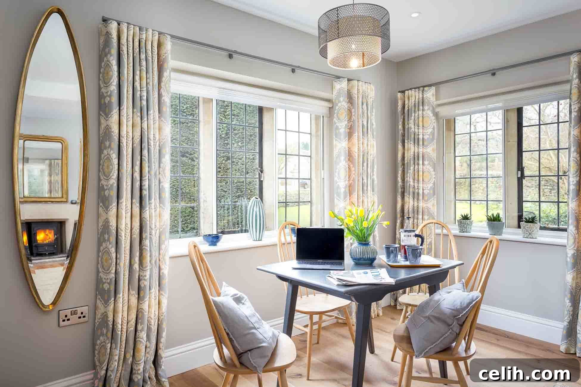 Cotswolds Cottage Inspired Country Chic Interiors 7 Wooden flooring works well on the floor in this country-chic interior