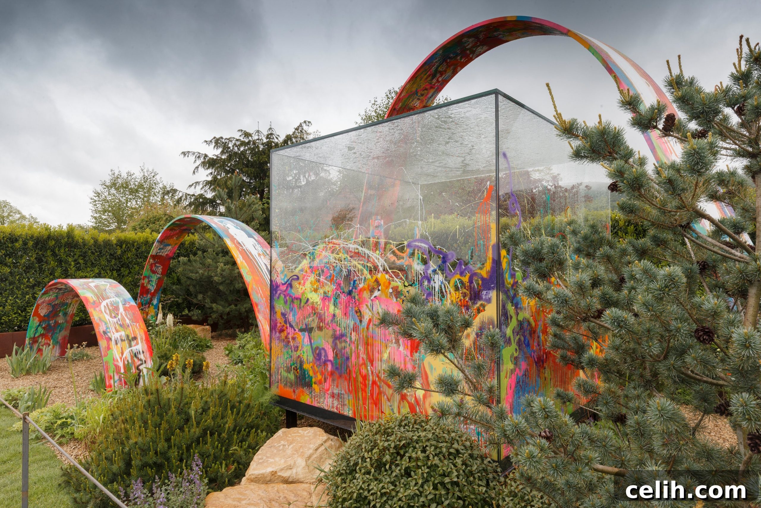 RHS Malvern Spring Festival 2019 Premier Show Gardens 2 The 'What If' show garden by Sebastian Conrad and Kate Rees, supporting Rees Foundation, at RHS Malvern Spring Festival 2019, featuring bold colours and structures.