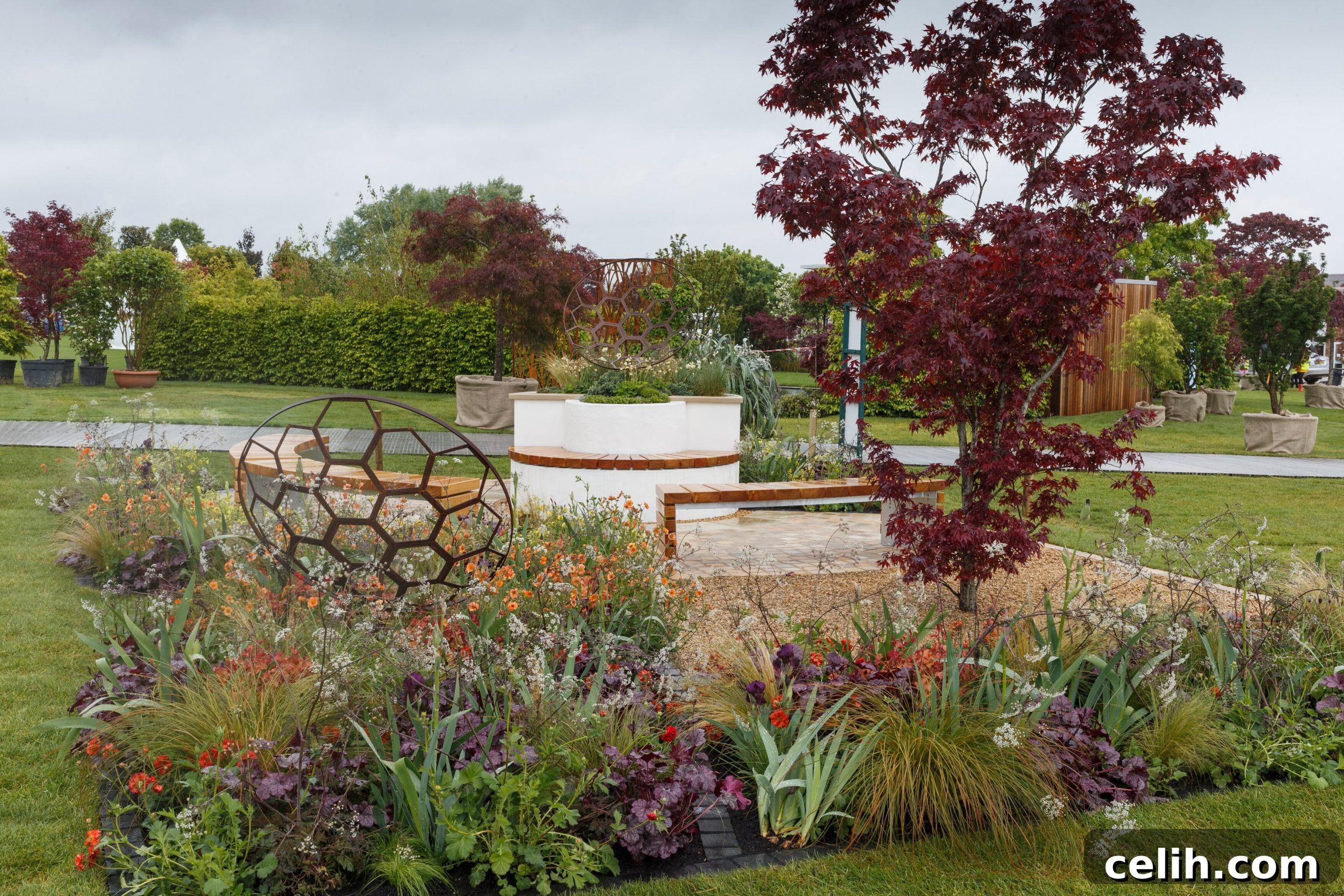 RHS Malvern Spring Festival 2019 Premier Show Gardens 4 The Red Shift show garden by Julie Bellingham, sponsored by the Institute of Physics, exploring astronomical themes at RHS Malvern Spring Festival 2019.
