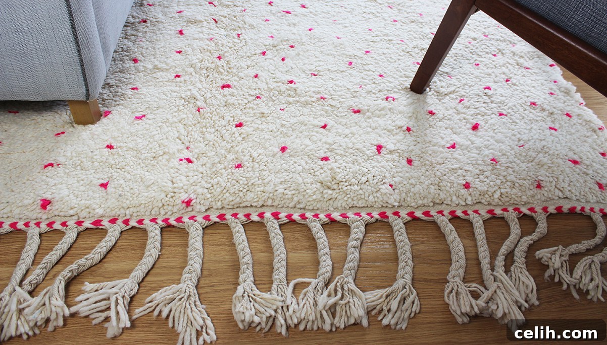 Lovely Zakaria Berber rug from Harfi, specialists in artisan made Moroccan rugs, featuring a neutral palette with a hint of color.