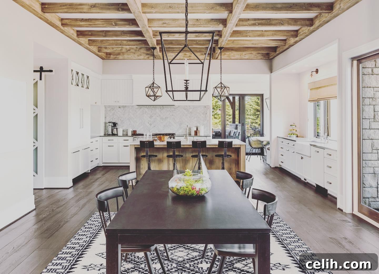 Elevate Your Decor with Grand Handmade Rugs 3 The large handmade rug helps define the dining area, adding elegance and warmth.