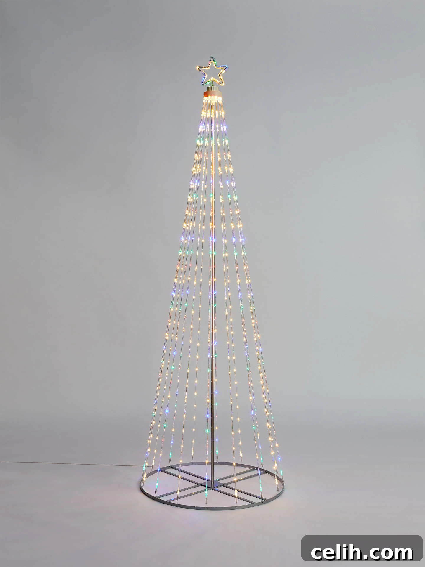 Stunning contemporary minimal maypole style Christmas tree light decoration with numerous LEDs