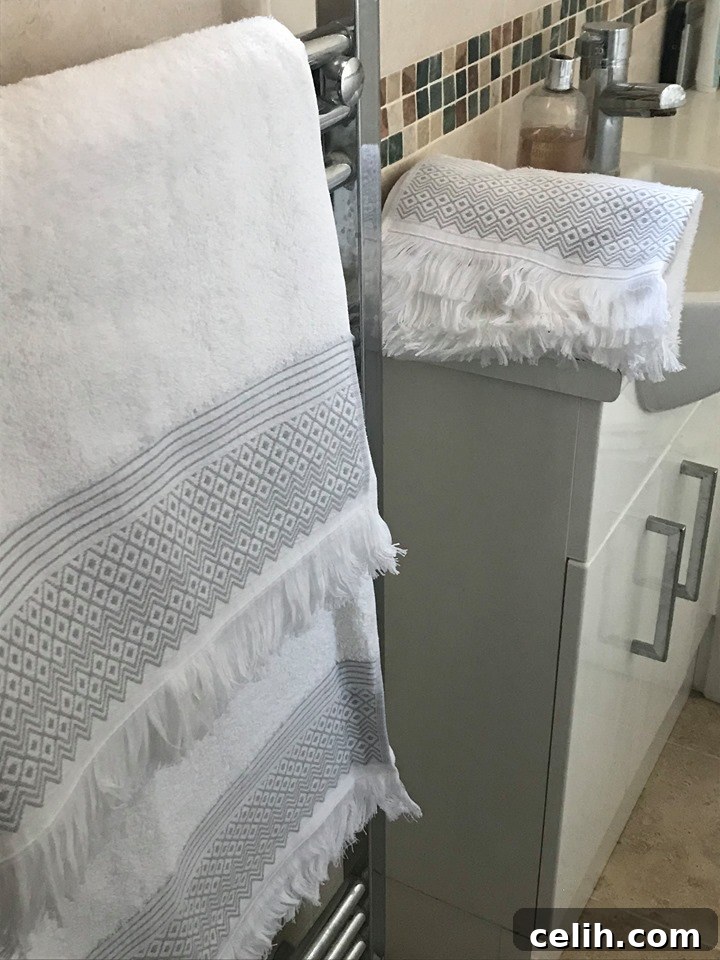 Experience unparalleled softness and sophisticated style with Allure Bath Fashions' Diamond Jacquard luxury towels featuring an elegant geometric design.