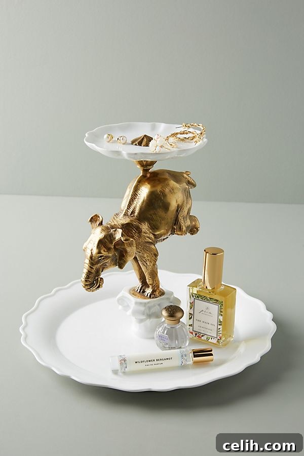 Weird, wacky, and wonderful hand-painted porcelain balancing elephant decorative tray, perfect for serving or display.