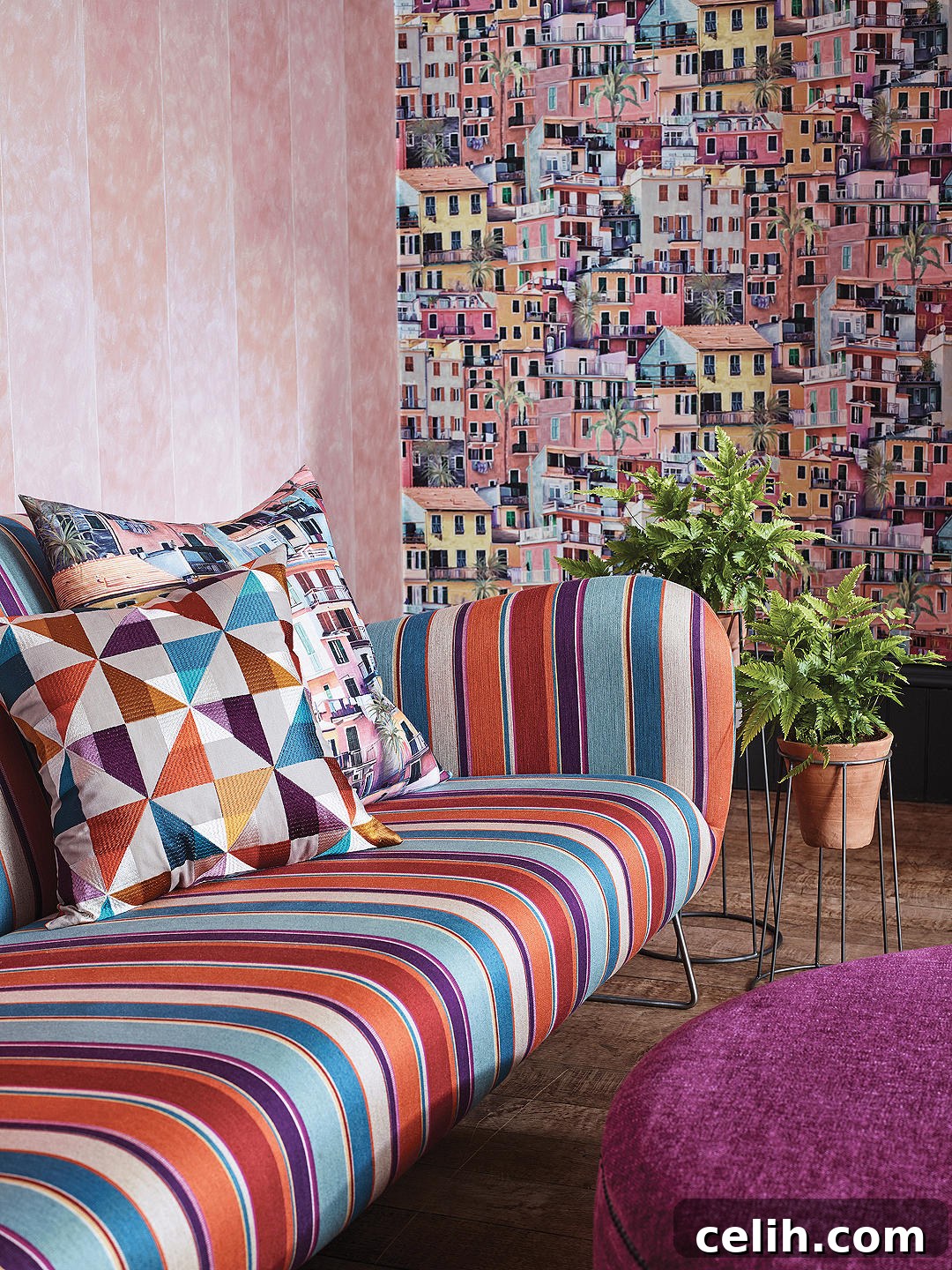 A busy wallpaper design of colourful houses beautifully integrated into an interior setting.
