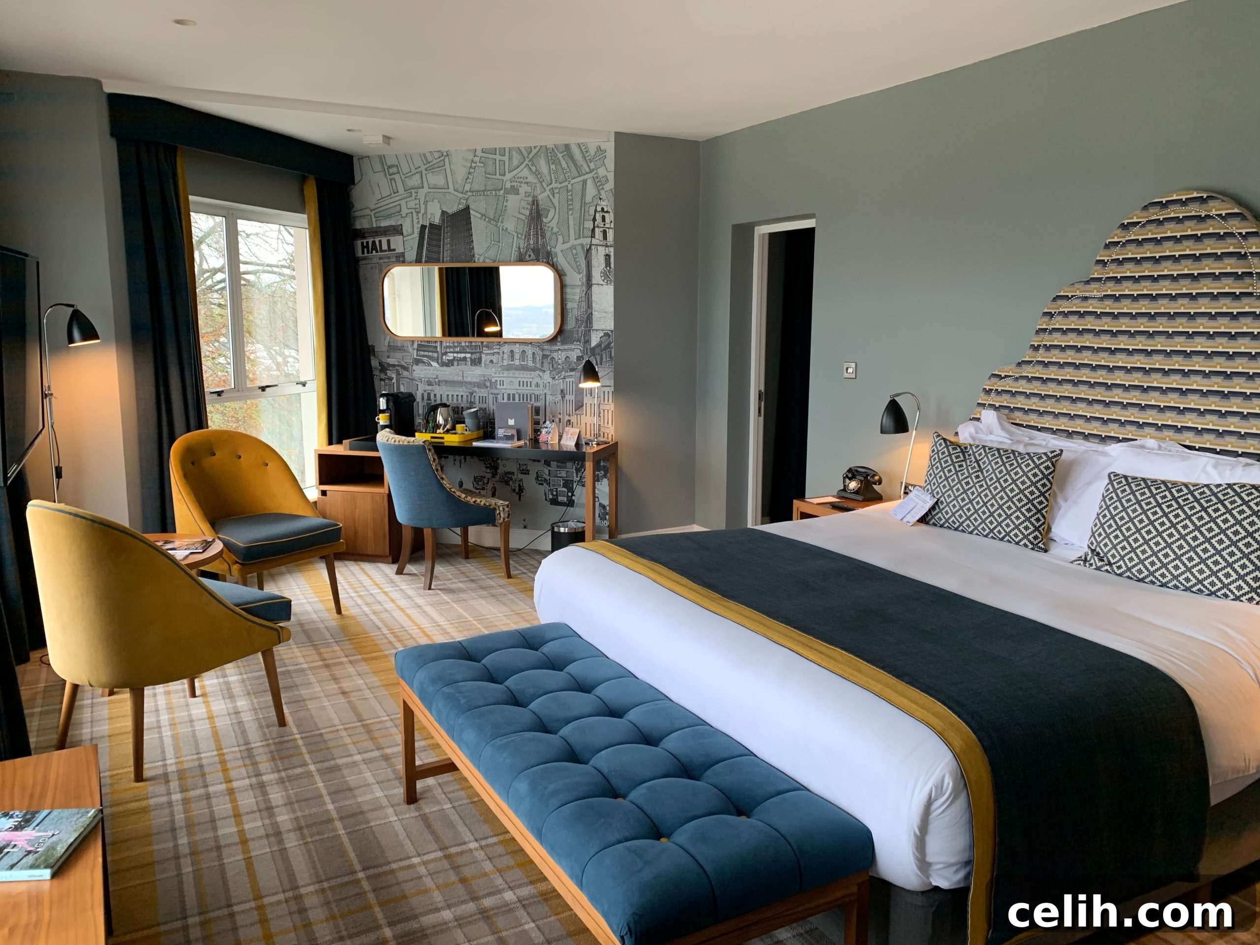 Contemporary interior with velvet furniture and headboard