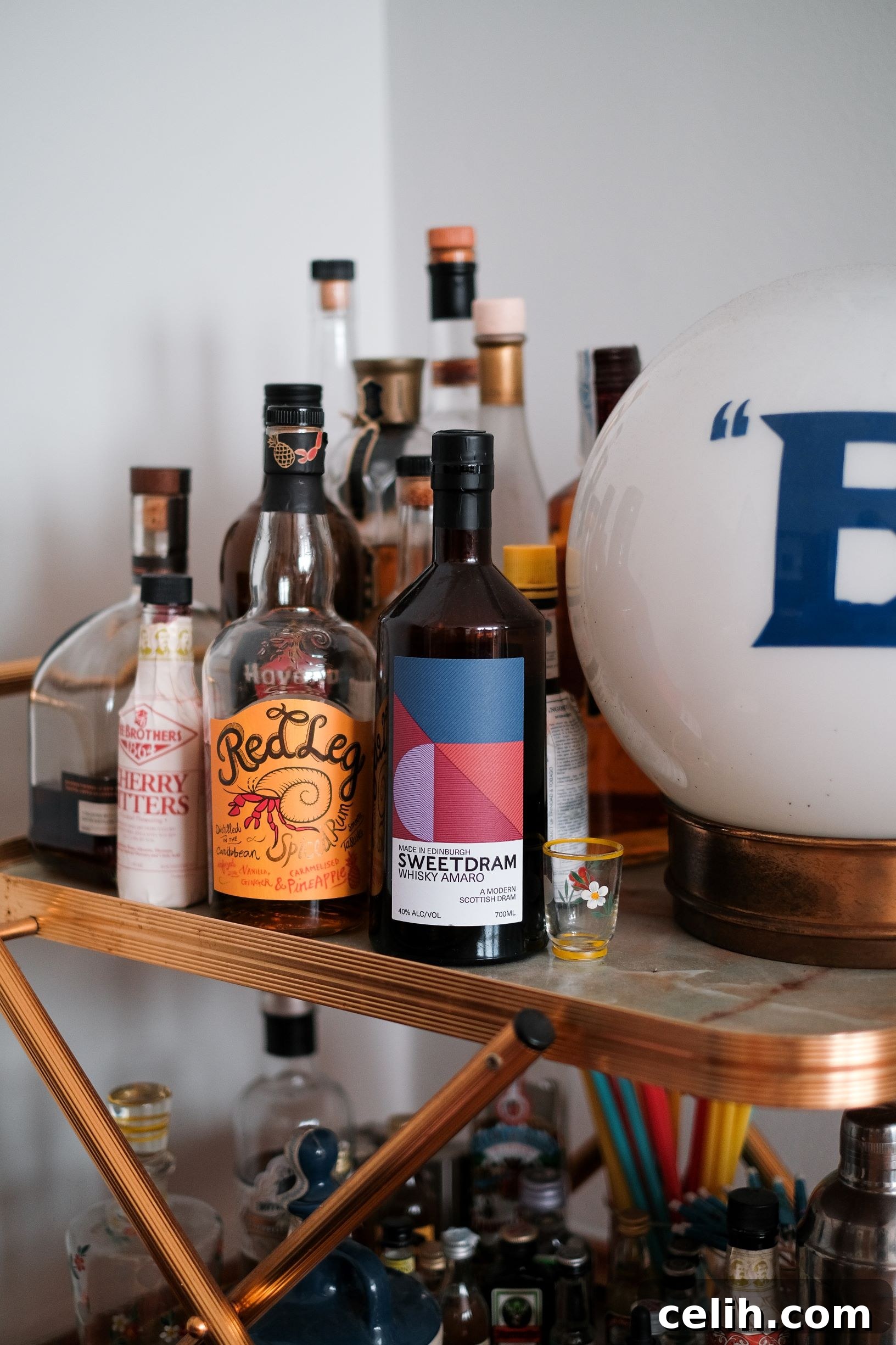 Mastering the Art of Alfresco Entertaining 2 Well stocked bar cart or drinks trolley for an outdoor party