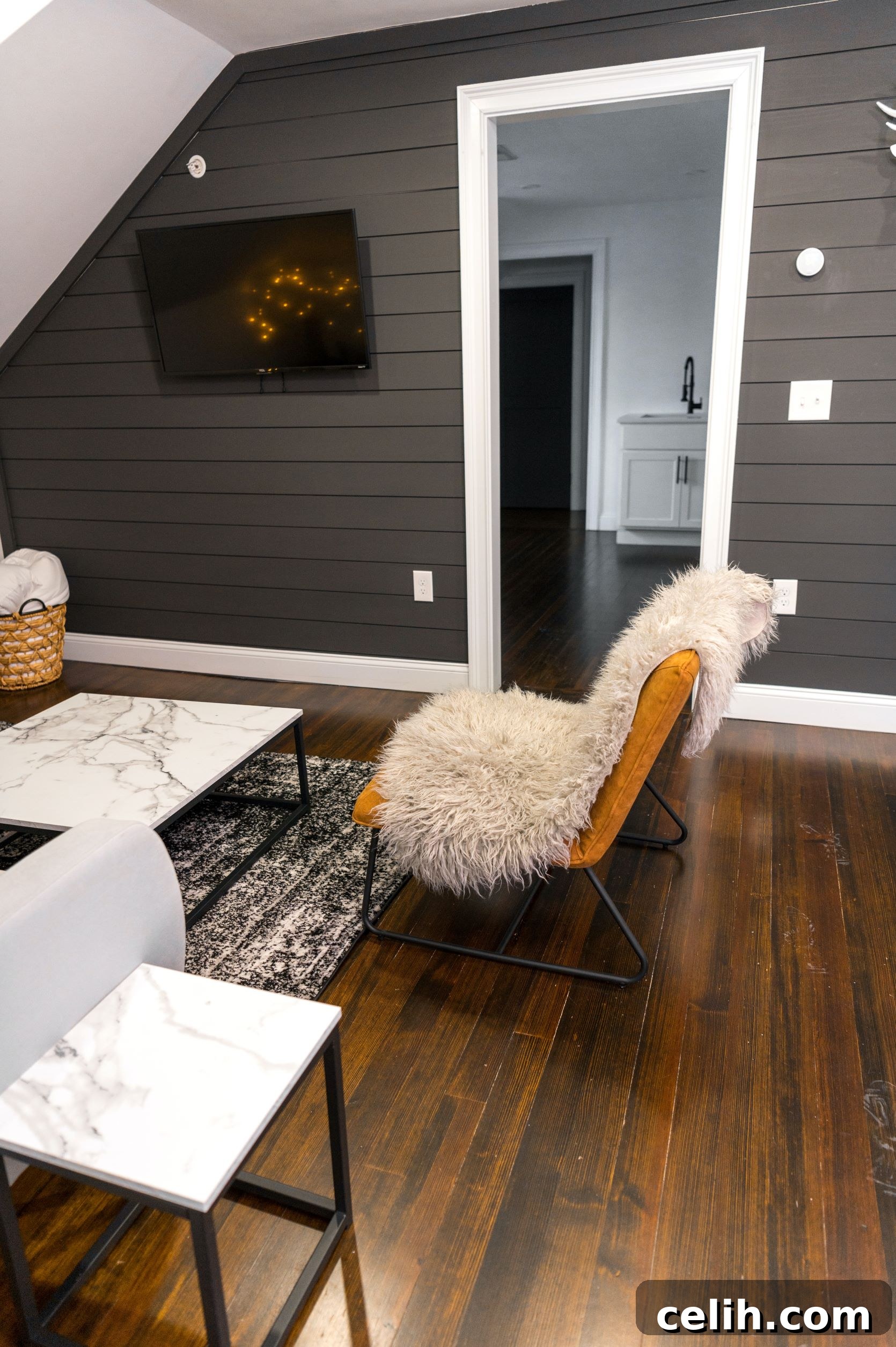 Engineered Wood Floors: Style Durability and Value 6 Engineered wood floor in an attic room, showcasing design flexibility and a wide array of choices to fit any interior style.