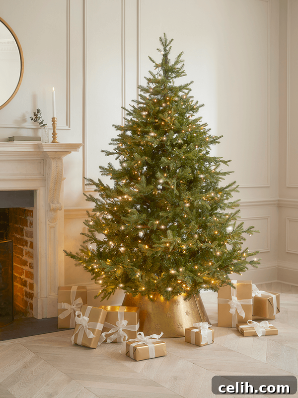 Deck the Halls for Less: Friday Christmas Decor Sale at Cox and Cox 5 Luxurious Aspen Mountain Spruce 8ft pre-lit Christmas tree from Cox & Cox for a grand festive display